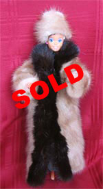 Full length fur doll coat with natural pastel mink sides and full skin ranch mink tuxedo front.